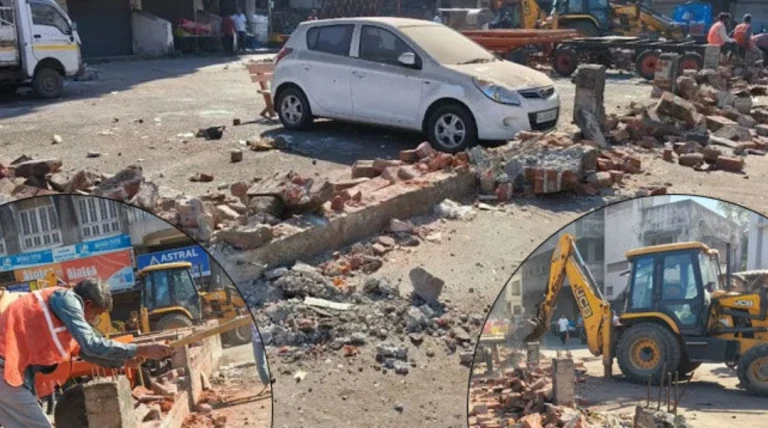 સુરતમાં ગેરકાયદે દબાણો પર કાર્યવાહી: ધારાસભ્યની માંગણી પછી જ પોતાની ભલામણથી બનેલી દિવાલ પર જ ચાલ્યું બુલડોઝર